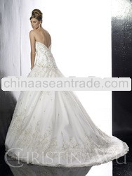 Basque waistline jewel encrusted neckline full tulle skirt strapless wedding dress