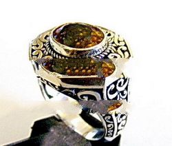 Bali Ring With Oval Citrin And Cawi Motif Carving