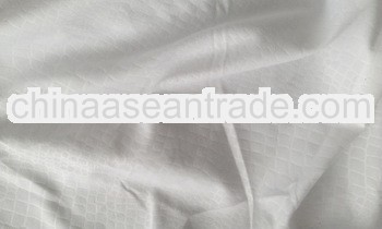 100%polyester Microfiber solid colour seersucker bed sheeting fabric with press bubble