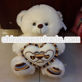 2013 Fashionable stuffed plush fabric teddy bear toy with a hear