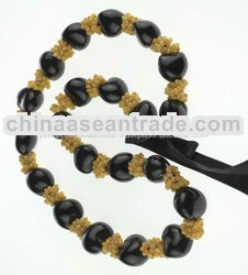 Black Kukui Nut Leis with Yellos Seashells