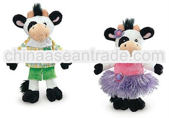 A couple of Custom animal felt cow finger puppet