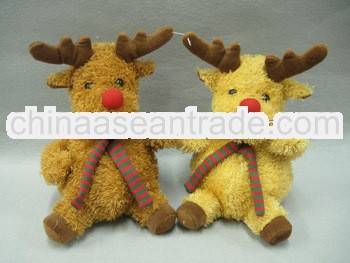 A couple of plush Christmas reindeer decorations