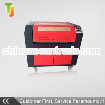 Best selling !!TJ-1390 1300*900mm 100W RECI CO2 cnc laser cutting machine price