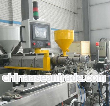 Computer controlled drip tube machine for inline cylinder dripper drip line