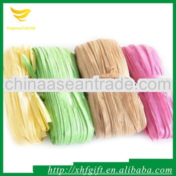 Dye colored raffia for gift wrapping