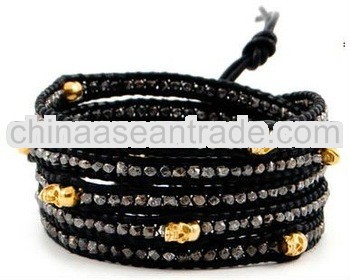 Fashion Jewelry Gunmetal Nugget and Gold Skull Wrap Bracelet on Black Leather