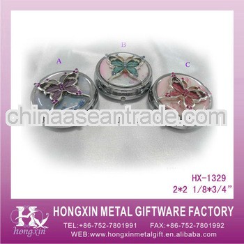 HX-1329 round epoxy butterfly metal pill box