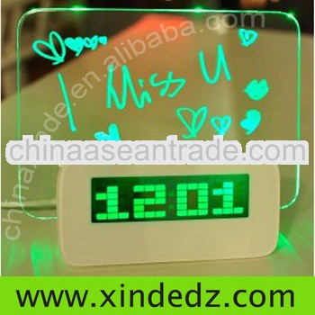 LED alarm clock with message board and fluorescent pen