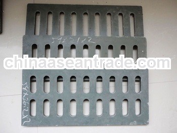 Plastic sidewalk drain grate