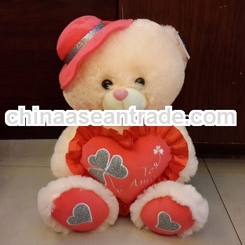 Promotional plush bear toy with a heart for lovers