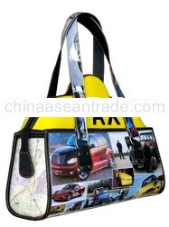 Reused taxi rooftop sign + automobile magazine handbag