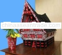 Miniature Indonesian tribe's house with light