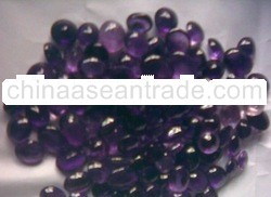 Cabochon cut dark purple Amethyst