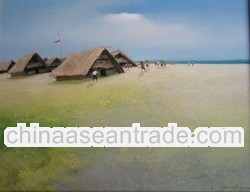 People and houses on the seafront.