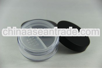 loose powder jar with rotating sifter with black lids