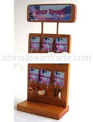 set of wooden earring with display stand