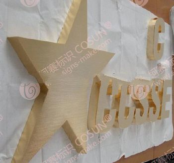 stainless steel golden shop sign