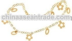 14K Yellow Gold Flower and Oval Dangle Anklet