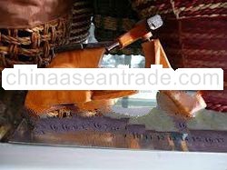 miniature wood Vespa motorcycle